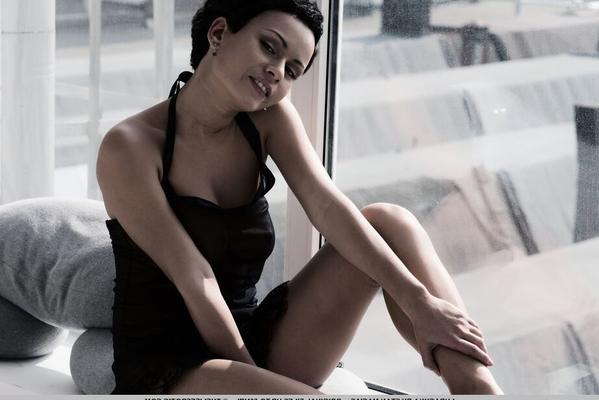 16P Short haired girl Pammie Lee removes a black dress for great nude poses