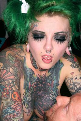 17P Tattooed goth girl Sydnee Vicious rides big cock with big fake tits exposed