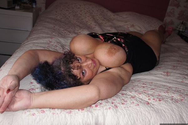 20P Big titted horny mature in black lingerie showcasing her massive big BBW tits
