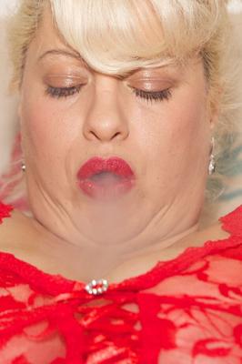 20P Blonde cougar in provocative lingerie Gina Geore fingers herself while smoking