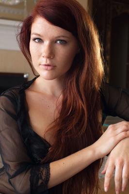 18P Redhead Euro babe loosing big natural teen tits during glamour shoot
