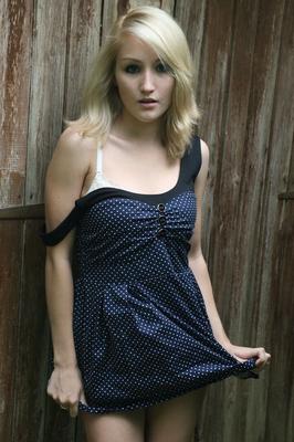 16P Blonde amateur Rachelle Summers does a sexy striptease against wood fence