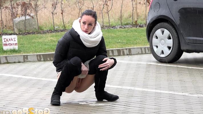 15P Eveline Neill squats to piss in a car park
