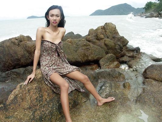 12P Hot and busty Thai ladyboy skinny dipping on a Phuket's beach