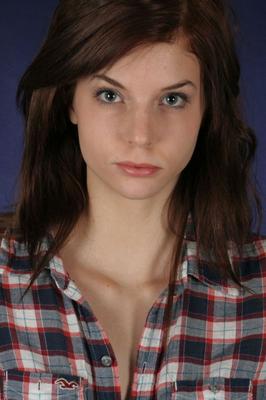 17P Solo girl with a pretty face and smile removes her clothes in a teasing way