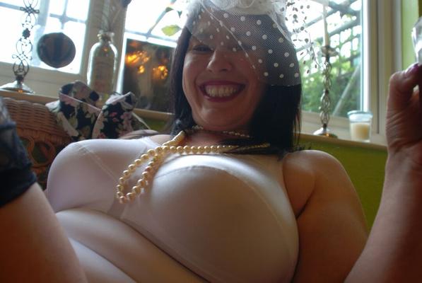 16P Older British amateur Juicey Janey exposes her bush while smoking & drinking