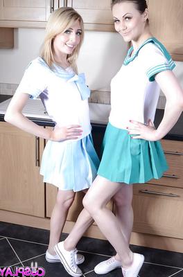 16P Cute coed cheerleaders Jessica Jensen and Tina Kay licking bald slits