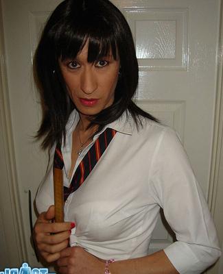 15P TGirl wearing a horny tartan skirt shoots her load over a juicy ass