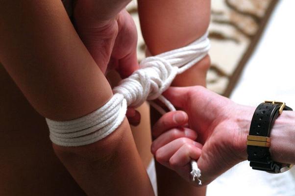 12P Blonde girl in her bra and underwear is ballgagged and tied up on her bed