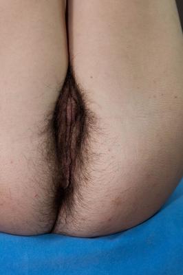 17P Blonde with tiny tits Selena reveals her body & bushy cunt in solo striptease