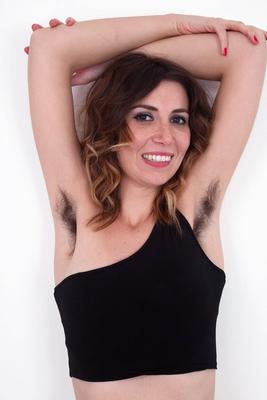 16P Hairy girl Terri Rose spreads her legs and natural pussy wide open