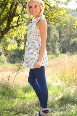 21P Adorable blonde Lucy Anne reveals her titties wearing blue nylons outdoors