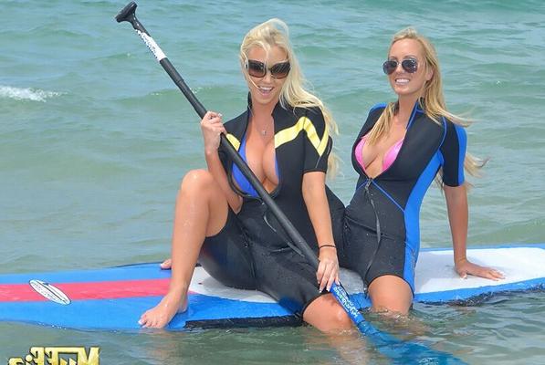 10P Lesbian babes strip off wet suits before eating pussy back at hotel room