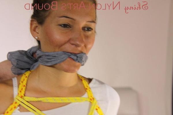 16P Sexy Sandra being tied and gagged with ropes and a clothgag wearing a