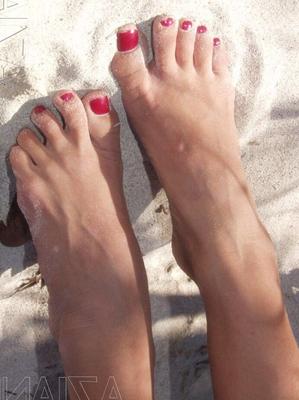 20P Beauty Crissy Moran loses her shirt and reveals her fake tits on the beach