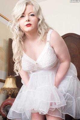 16P Mature platinum blonde plumper Danni Marie strips to retro garters and nylons