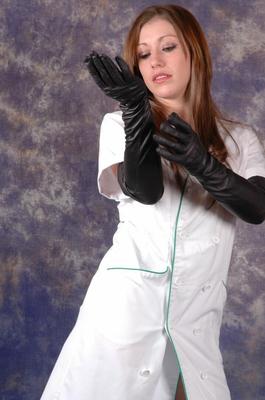 15P Gorgeous Nurse Sophie shows off her long sexy stockinged legs and long black