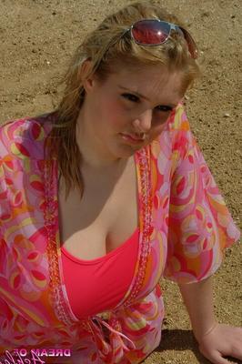 16P Fatty model Ashley Sage Ellison sunning her big melons on the beach in bikini