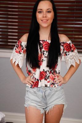 18P Dark haired teen Bambi Black finger spreads her tight slit on a bed