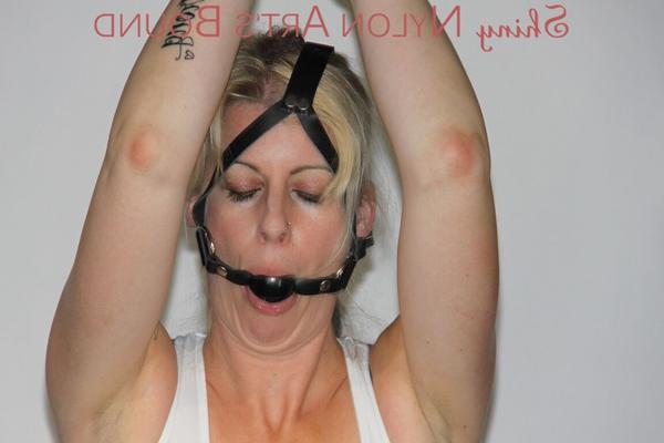 16P Sexy Pia tied and gagged overhead with chains, cuffs and a holster with a