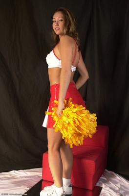 16P Amateur Latina chick Mailia releasing tiny breasts from cheerleader outfit