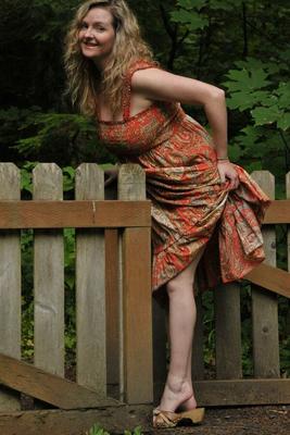 15P Older amateur Tasty Trixie exposes her nice big tits by picket fence