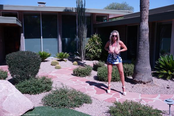 10P Blonde housewife Wifey exposes her fake tits while out in her backyard