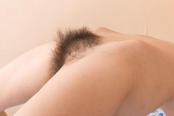16P Cute young Halmia disrobes to display small tits & very hairy beaver close up