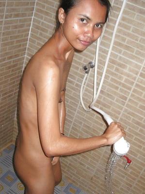 16P Skinny asian babe with tiny tits taking a shower and getting banged