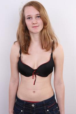 20P Young redhead amateur with small saggy boobs shows her big nipples close up