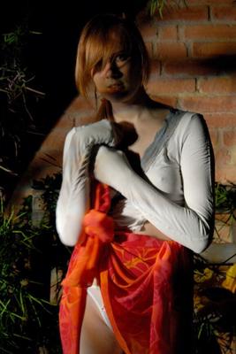 16P Natural redhead Lina exposes her upskirt underwear while in a garden setting