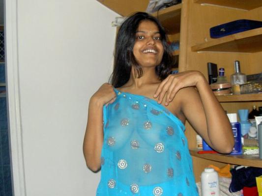 12P Desi housewife Aprita lets her brassiere slip while posing non nude