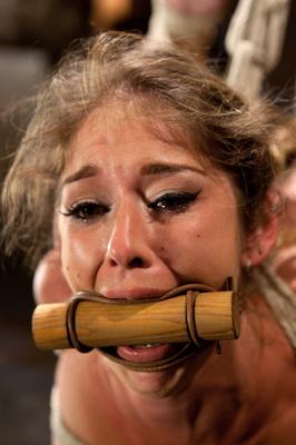17P Latin-American female is hogtied and suspended by ropes before being tortured