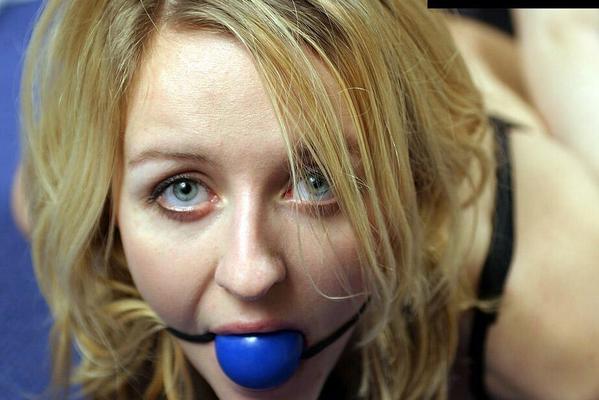 12P Blonde chick in black underwear and rope bindings spits out ball gag