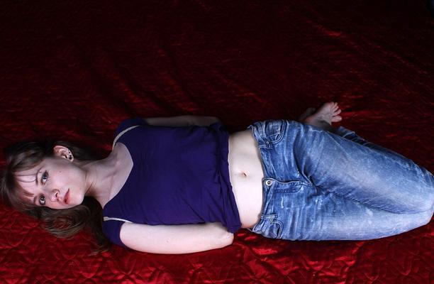 16P Barefoot white girl Agnes is hogtied in a shirt and blue jeans