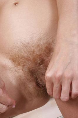 17P Blonde woman with tiny tits Julia twitches her hairy vagina in the kitchen