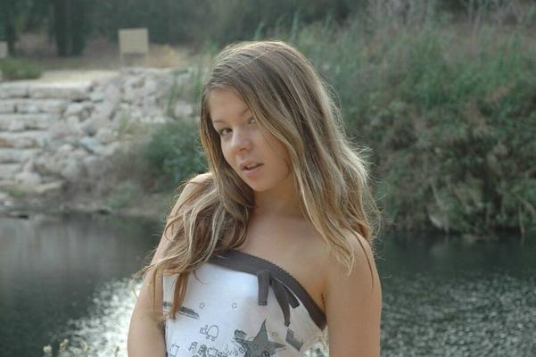 15P Young emily showing everything next to a river