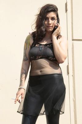 16P Latina model Lucy Deville posing for fully clothed candid shots outdoors