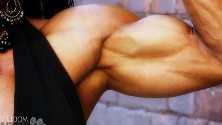 21P Sweet American bodybuilder woman Marina Lopez shows her biceps outdoors