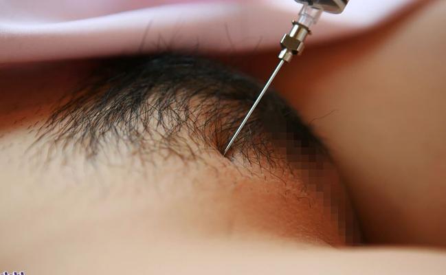 16P Kinky Japanese nurse Namie Koshino pokes her naked body parts with a needle