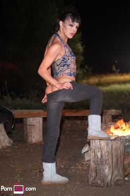21P Fantastic babe with big tits Cytherea unveils her tiny boobs by the fire