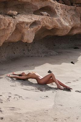 21P Brunette cutie Melena A reveals her fine ass and nice boobs on the beach