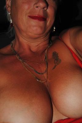 20P Mature woman Dimonty exposes her big tits and pussy while in public