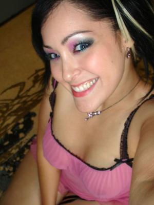 12P Kitty takes self pictures of her in a cute pink nighty