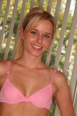 16P Blonde girl slips off her underwear for her first nude poses