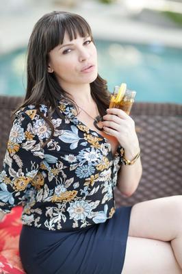 15P Gorgeous brunette MILF Dana DeArmond reveals her perfect ass on the patio