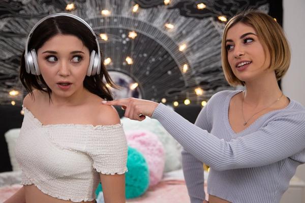 15P Luna Daniels is having fun dancing around her bedroom with her headphones on