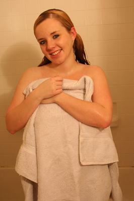 12P Busty teen shows off her tight round ass in the bubble bath