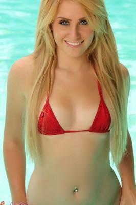 12P Sexy blonde Ashley Vallone loses her bikini top while having fun in the water