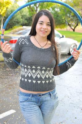 16P Chubby brunette takes off all her clothes in public while working a hula hoop